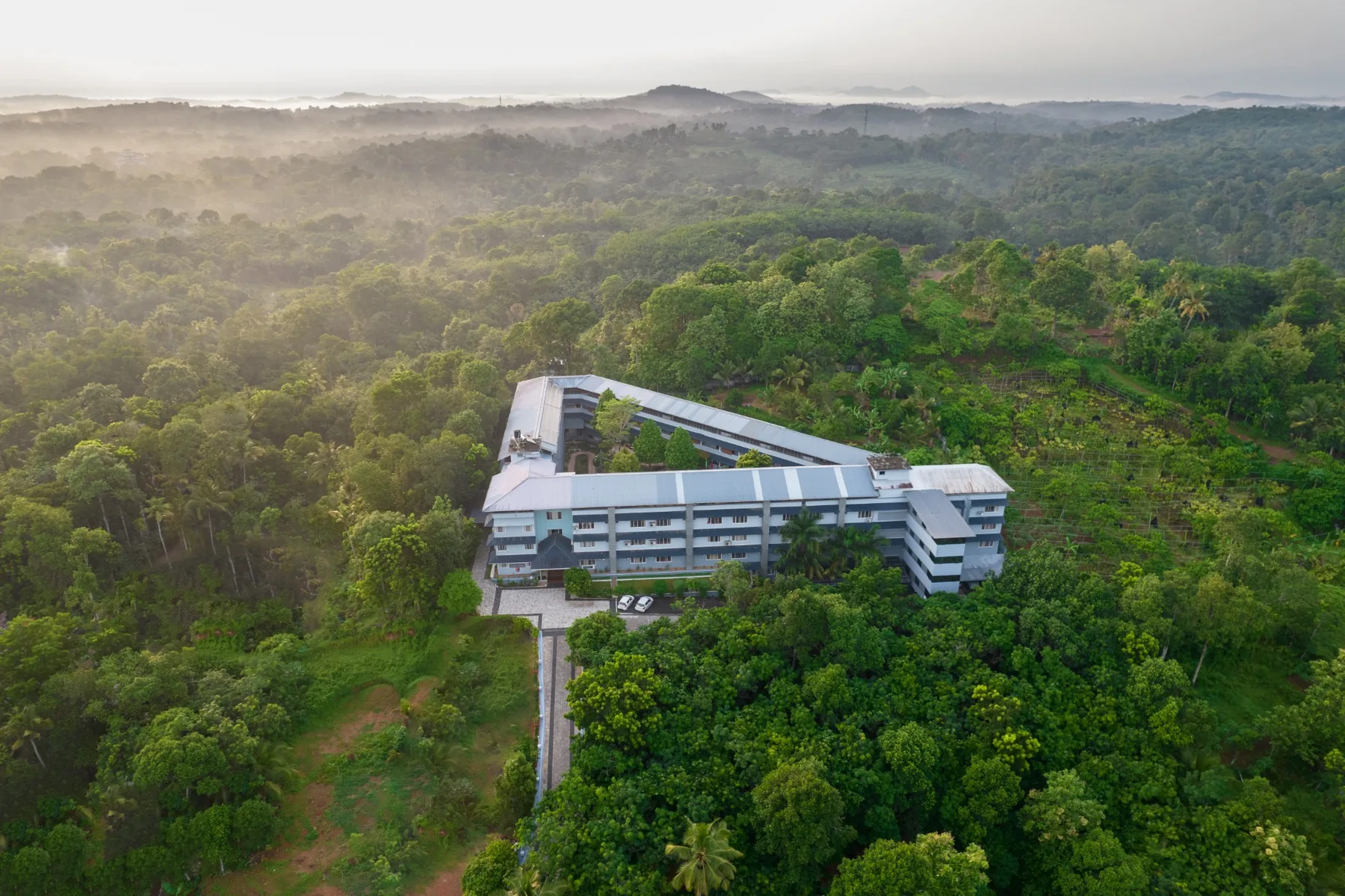 Travancore Foundation senior living campus surrounded by Kerala greenery